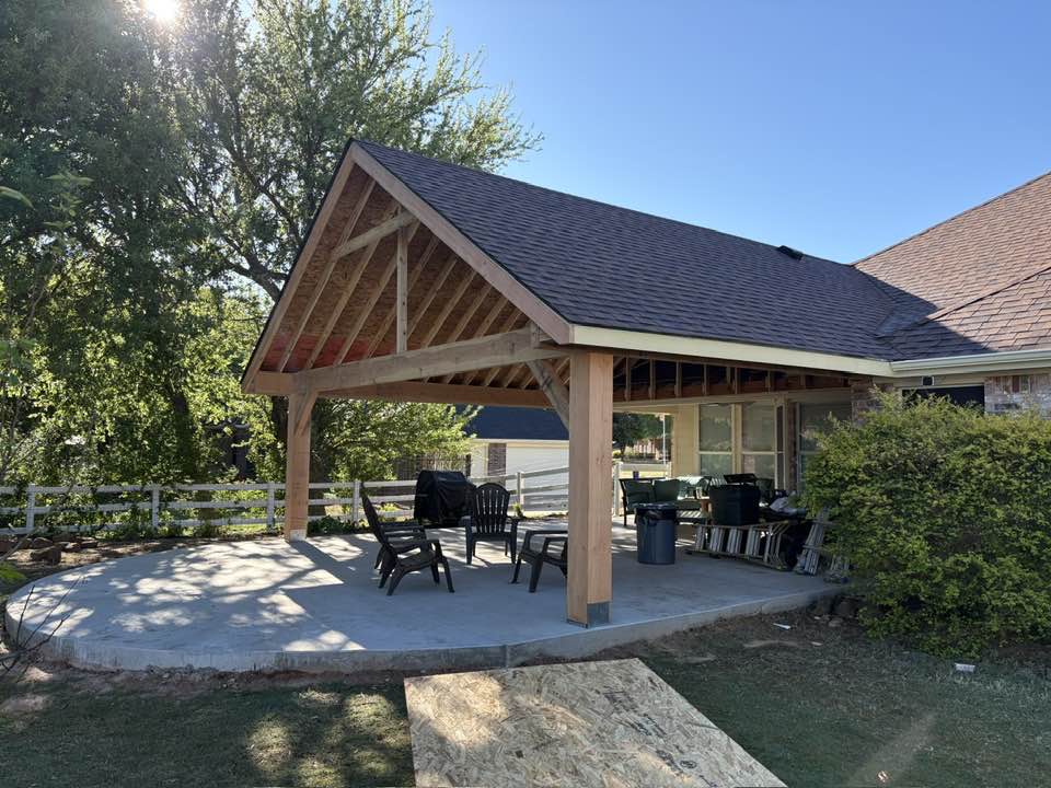 Raw unstained gable structure with new rounded concrete poured